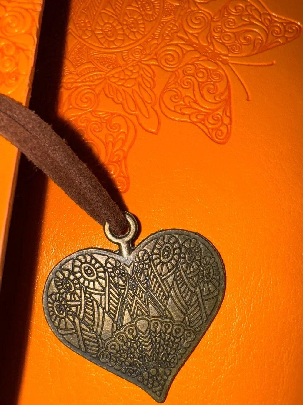 Orange Embossed Travel Journal with Heart Charm